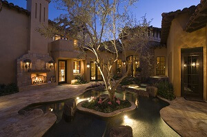Beautiful outdoor living space with water feature